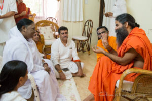amrita yoga, amma talks with yoga baba ramdev
