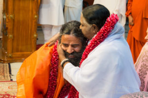 amrita yoga, amma hugs yogi baba ramdev