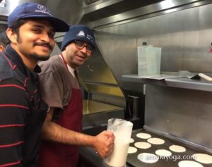 amma volunteers making pancakes