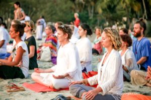 group meditation at amritapuri beach