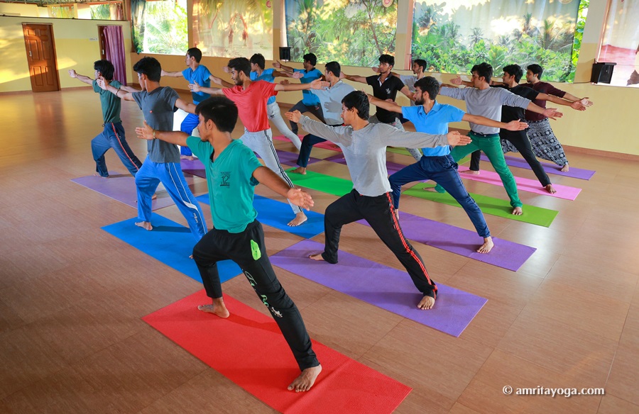 group warrior pose amrita yoga yoga shala watermarked