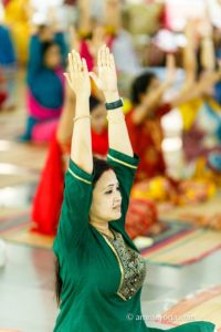 standing pose, green shirt