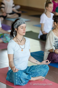 meditation asana with hands on knees